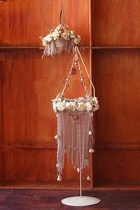 Cream and bronze flower handbasket (flowergirl). Cream and bronze floor confetti stand